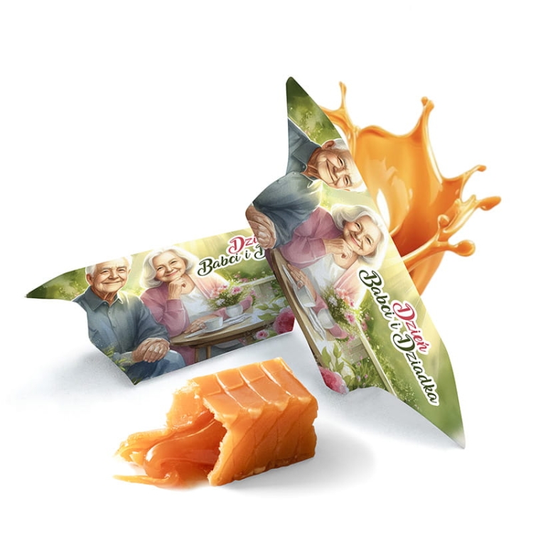 Mleczna krówka w ozdobnych papierkach na Dzień Babci i Dziadka.