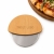 Nóż do pizzy z grawerem logo firmy na bambusowym uchwycie.